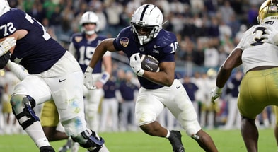 Penn State Nittany Lions running back Nicholas Singleton (10) runs the ball in the second half against the Notre Dame Fighting Irish  in the Orange Bowl at Hard Rock Stadium. (Mandatory Credit: Nathan Ray Seebeck-Imagn Images)