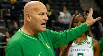Oregon head coach Kelly Graves instructs his team in an exhibition game against Warner Pacific. (Photo by Ben Lonergan/The Register-Guard)