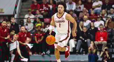Jan 14, 2025; Tuscaloosa, Alabama, USA; Alabama Crimson Tide guard Mark Sears (1) drives the ball against the Mississippi Rebels during the first half at Coleman Coliseum. Mandatory Credit: Will McLelland-Imagn Images