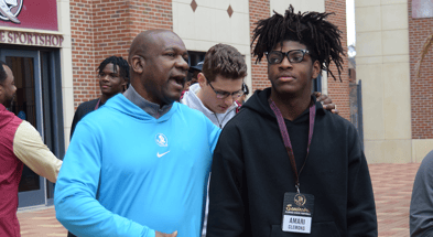 Amari Clemons with Florida State Coach David "YAC" Johnson on his Florida State visit (Matt LaSerre/Warchant)