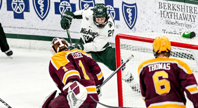 Michigan State's Daniel Russell moves the puck near the goal against Minnesota during the third period on Friday, Jan. 26, 2024, at Munn Arena in East Lansing - Nick King, USA TODAY Sports