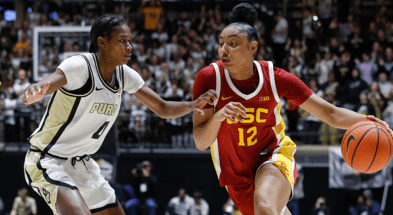 Purdue Boilermakers guard Destini Lombard (4) defends USC Trojans guard JuJu Watkins (12) Wednesday, Jan. 22, 2025, during the NCAA women’s basketball game at Mackey Arena in West Lafayette, Ind. USC Trojans won 79-37