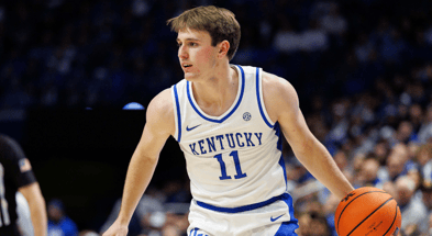 Jan 14, 2025; Lexington, Kentucky, USA; Kentucky Wildcats guard Travis Perry (11) handles the ball during the second half against the Texas A&M Aggies at Rupp Arena at Central Bank Center. Mandatory Credit: Jordan Prather-Imagn Images