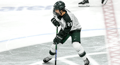 Michigan State's Red Savage moves the puck against Notre Dame during the second period on Friday, Dec. 8, 2023, at Munn Arena in East Lansing - Nick King, USA TODAY Sports