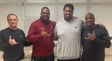 South Carolina coaches with four-star DT target Noah Clark (Photo: Noah Clark | X)