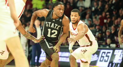 Chris Youngblood guards Josh Hubbard