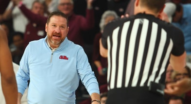 Jan 18, 2025; Starkville, Mississippi, USA; Mississippi Rebels head coach Chris Beard reacts toward an official during the second half against the Mississippi State Bulldogs at Humphrey Coliseum. Mandatory Credit: Petre Thomas-Imagn Images