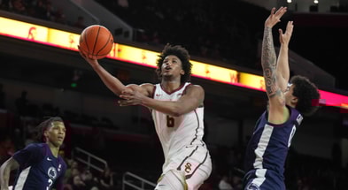 USC Trojans guard Wesley Yates III (6) shoots the ball against Penn State Nittany Lions guard Jahvin Carter (0) in the second half at Galen Center