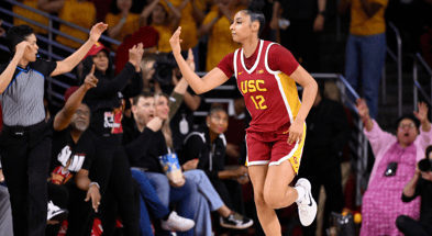 USC Trojans guard JuJu Watkins (12) shoots a jump shot over UCLA Bruins guard Gabriela Jaquez (11) during the first quarter at Galen Center