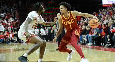 USC Trojans guard Desmond Claude (1) controls the ball against Rutgers Scarlet Knights guard Jeremiah Williams (25) during the first half at Jersey Mike's Aren