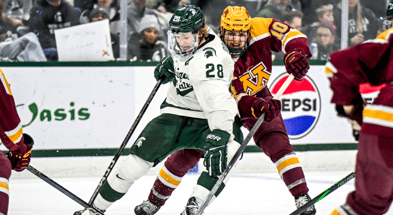 Michigan State's Karsen Dorwart, left, maneuvers around Minnesota's Connor Kurth during the second period on Saturday, Jan. 25, 2025, at Munn Arena in East Lansing - Nick King, USA TODAY Sports