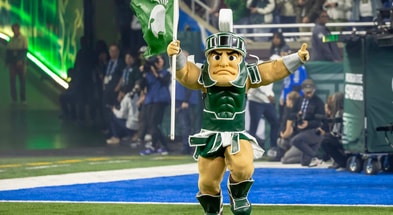 Sparty the Michigan State Spartans mascot runs out of the tunnel before the game against Penn State at Ford Field. - Dave Reginek, USA TODAY Sports