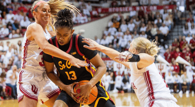 USC's Rayah Marshall (13) is double teamed by Indiana's Sydney Parrish (33) and Lexus Bargesser (1) during the Indiana versus University of Southern California women's basektball game at Simon Skjodt Assembly Hall on Sunday, Jan. 19, 2025