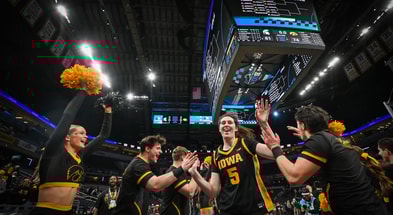Iowa center Ava Heiden exits the court after a win over Michigan State at the Big Ten Tournament. (Photo by Dennis Scheidt)