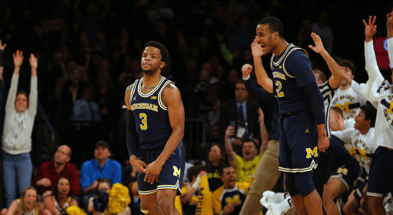 Michigan Wolverines basketball guards Zavier Simpson and Muhammad-Ali Abdur-Rahkman. (Photo by Brad Penner-Imagn Images)
