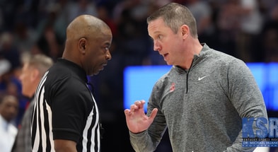 Georgia coach Mike White talks to an official - Photo by Dr. Michael Huang, Kentucky Sports Radio