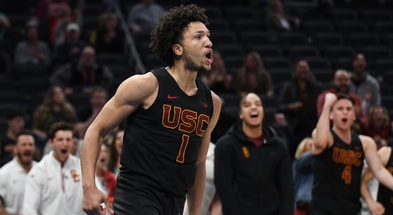 USC Trojans guard Desmond Claude (1) celebrates after a play during the second half against the Rutgers Scarlet Knights at Gainbridge Fieldhouse