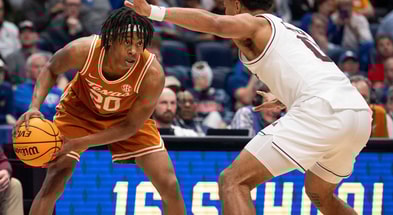 Texas Longhorns guard Tre Johnson (20) looks to pass during their second round game of the SEC Men's Basketball Tournament at Bridgestone Arena in Nashville, Tenn., Thursday, March 13, 2025 (© Nicole Hester / The Tennessean / USA TODAY NETWORK via Imagn Images)