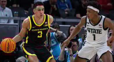 Oregon Ducks guard Jackson Shelstad (3) dribbles the ball while Michigan State Spartans guard Jeremy Fears Jr. (1) defends in the first half at Gainbridge Fieldhouse. - Trevor Ruszkowski, USA TODAY Sports
