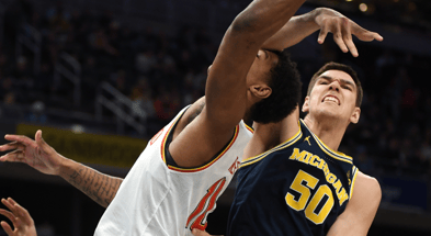 Michigan Wolverines basketball center Vladislav Goldin with a block against Maryland. (Photo by Robert Goddin-Imagn Images)