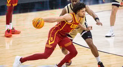 USC Trojans guard Desmond Claude (1) dribbles the ball while Purdue Boilermakers guard Myles Colvin (5) defends in the second half at Gainbridge Fieldhouse