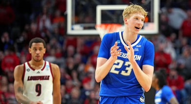 Mar 20, 2025; Lexington, KY, USA; Creighton Bluejays forward Jackson McAndrew (23) celebrates after beating the Louisville Cardinals in the first round of the NCAA Tournament at Rupp Arena. Mandatory Credit: Aaron Doster-Imagn Images