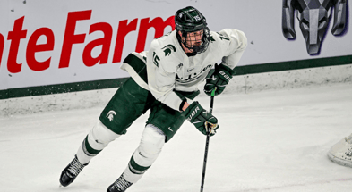 Michigan State's Charlie Stramel moves the puck against Notre Dame during the first period in the Big Ten tournament on Saturday, March 15, 2025, at Munn Arena in East Lansing. - Nick King, USA TODAY Sports