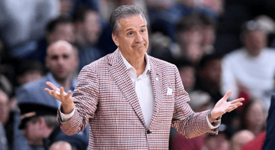 Arkansas head coach John Calipari shrugs off another win over Rick Pitino, via Brian Fluharty-Imagn Images