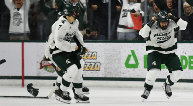 Michigan State forward Isaac Howard celebrates after scoring the game-winning goal against Ohio State, Saturday, March 22, 2025, winning the Big 10 Hockey Championship at Munn Ice Arena. Also pictured is David Gucciardi. - Matthew Dae Smith, USA TODAY Sports
