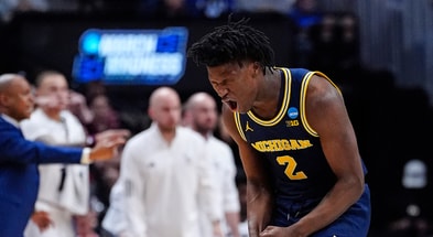 Michigan Wolverines basketball guard L.J. Cason scored 11 points in an NCAA Tournament win over Texas A&M. (Photo by Ron Chenoy-Imagn Images)