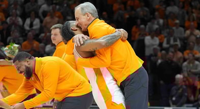 Tennessee's Zakai Zeigler (5) lifts Tennessee head coach Rick Barnes off the ground during Senior Day presentations after a menâ€™s college basketball game between Tennessee and South Carolina at Thompson-Boling Arena at Food City Center, Saturday, March 8, 2025. © Caitie McMekin/News Sentinel / USA TODAY NETWORK via Imagn Images