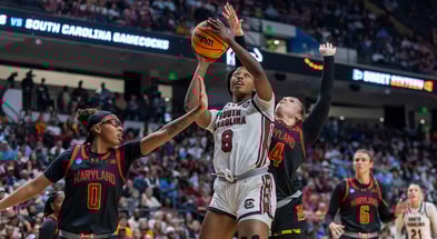South Carolina Gamecocks forward Joyce Edwards (8) works between Maryland Terrapins guard Shyanne Sellers (0) and forward Allie Kubek (14) to get off a shot during the first half of a Sweet 16 NCAA Tournament basketball game at Legacy Arena. Mandatory Credit: Vasha Hunt-Imagn Images