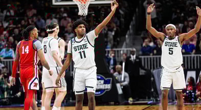 Michigan State guards Jase Richardson (11) and Tre Holloman (5) celebrate against Ole Miss during the second half of the Sweet 16 round of the NCAA tournament at State Farm Arena in Atlanta on Friday, March 28, 2025.© Junfu Han / USA TODAY NETWORK via Imagn Images