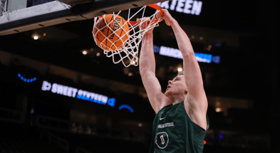Michigan State Spartans forward Jaxon Kohler (0) dunks during NCAA Tournament South Regional Practice at State Farm Arena. - Brett Davis, USA TODAY Sports