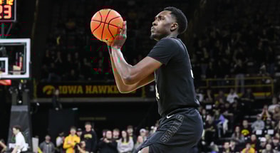 Michigan State Spartans forward Xavier Booker (34) shoots the ball against the Iowa Hawkeyes during the first half at Carver-Hawkeye Arena. - Jeffrey Becker, USA TODAY Sports