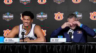 Dylan Cardwell and Bruce Pearl (Photo by USA Today)