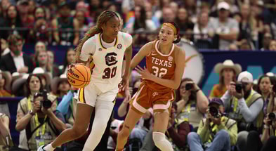 South Carolina Gamecocks forward Maryam Dauda (30) dribbles against Texas Longhorns guard Ndjakalenga Mwenentanda (32) during the second quarter in a semifinal of the women's 2025 NCAA tournament at Amalie Arena. Mandatory Credit: Nathan Ray Seebeck-Imagn Images