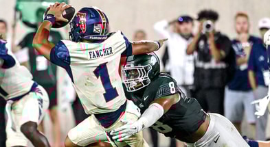 Michigan State's Anthony Jones, right, tackles Florida Atlantic's Cam Fancher during the fourth quarter on Friday, Aug. 30, 2024, at Spartan Stadium in East Lansing. - Nick King, USA TODAY Sports