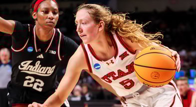 Utah Utes guard Gianna Kneepkens (5) drives past Indiana Hoosiers guard Chloe Moore-McNeil (22) in the second half at Colonial Life Arena. Mandatory Credit: Jeff Blake-Imagn Images