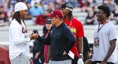 South Carolina head coach Shane Beamer with Tamarion Watkins, J'Zavien Currence, and Joshua Dobson (Photo:: Katie Dugan | GamecockCentral.com)