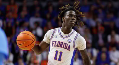 Mar 8, 2025; Gainesville, Florida, USA; Florida Gators guard Denzel Aberdeen (11) dribbles the ball against the Mississippi Rebels during the second half at Exactech Arena at the Stephen C. O'Connell Center. Mandatory Credit: Matt Pendleton-Imagn Images