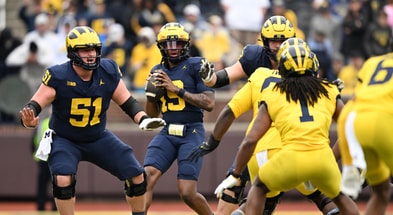 Michigan Wolverines football quarterback Bryce Underwood and center Greg Crippen during the 2025 spring game. (Photo by Lon Horwedel / TheWolverine.com)