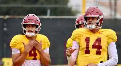 USC QBs Husan Longstreet (4) and Jayden Maiava (14)