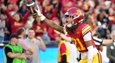 USC Trojans cornerback Greedy Vance Jr. (21) celebrates after intercepting a pass against Nebraska Cornhuskers quarterback Dylan Raiola (15) for the game victory at the Los Angeles Memorial Coliseum