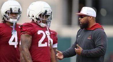 Alabama RB Jam Miller and RB coach Robert Gillespie
