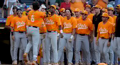 (Gary Cosby Jr. / USA TODAY NETWORK via Imagn Images) May 22, 2025; Hoover, AL, USA; Tennessee shortstop Gavin Kilen (6) is congratulated by teammates after hitting a solo homer to give Tennessee the lead in the 10th inning in the third round of the SEC Baseball Tournament at the Hoover Met. Tennessee eliminated Texas with a 12-inning 7-5 victory. Kilen drove in all three runs in extra innings.