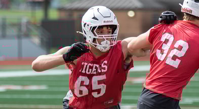 Cooper Hackett going through drills
