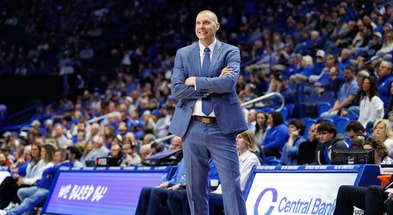 Feb 8, 2025; Lexington, Kentucky, USA; Kentucky Wildcats head coach Mark Pope smiles as he watches the action during the second half against the South Carolina Gamecocks at Rupp Arena at Central Bank Center. Mandatory Credit: Jordan Prather-Imagn Images