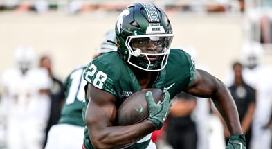 Michigan State's Brandon Tullis runs for a gain against Prairie View A&M during the fourth quarter on Saturday, Sept. 14, 2024, at Spartan Stadium in East Lansing. - Nick King, USA TODAY Sports