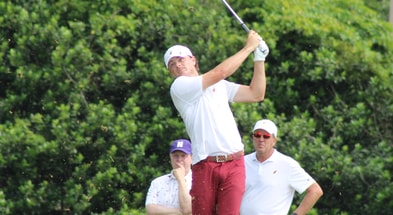 Luke Clanton hits an iron shot on hole eight of Seminole Legacy (Matt LaSerre/Warchant)